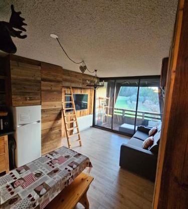 Studio cabine 4 pers Cosy esprit chalet Les glovettes
