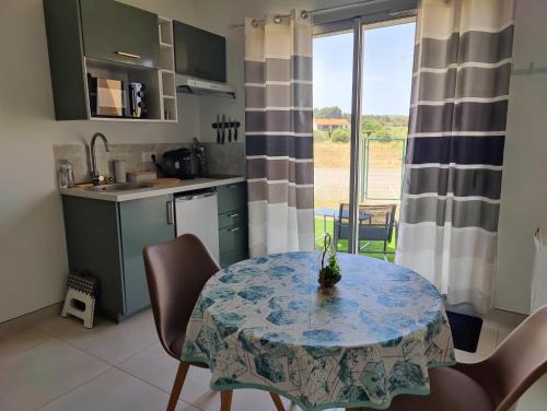 Studio cosy bordé par les vignes