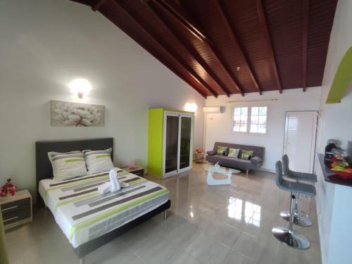 Studio Fressinette ou F3 Charme Exotique - Capesterre-Belle-Eau, balcon, vue mer et proche plage