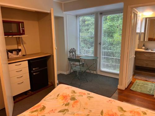 Studio is 2nd door past carport