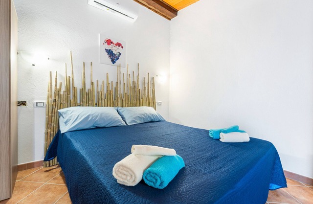 Estudio 'L'Arancio' con vistas a la montaña, terraza privada y aire acondicionado