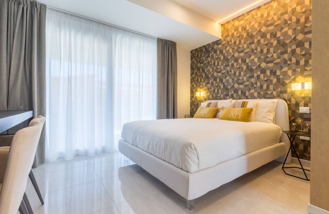 Estudio "Residence Meridian Unità 5" cerca de la playa, con vistas a la montaña, piscina y Wi-Fi