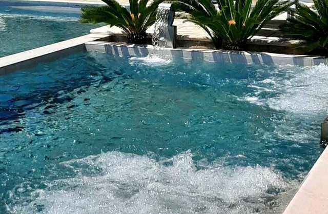 Studios Il Gabbiano, studio flat with garden, parking and swimming pool