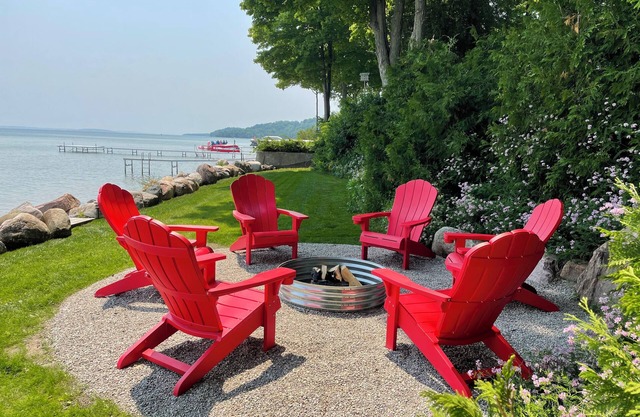 Stunning 150' ft footage on bay, 2 beachfront homes, 5 bedrooms & game room.