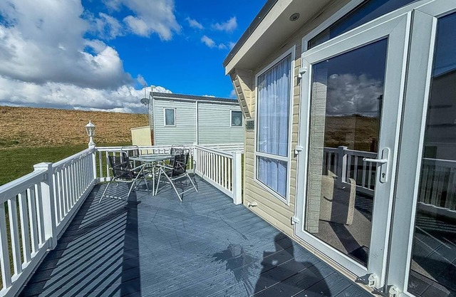 Stunning 6 berth caravan with decking at Naze Marine Holiday Park ref 17365BR
