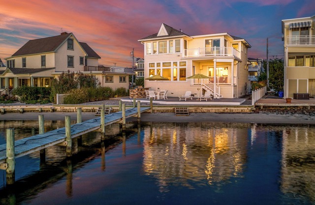 Stunning bayfront w/private bay beach and dock