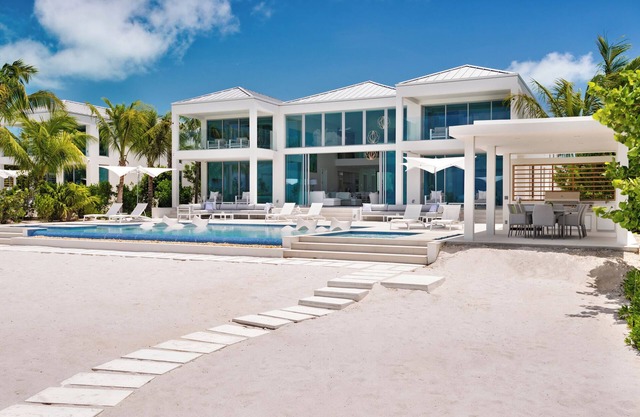 Stunning beachfront villa with 2 stories of windows to take in the ocean view - Seaclusion
