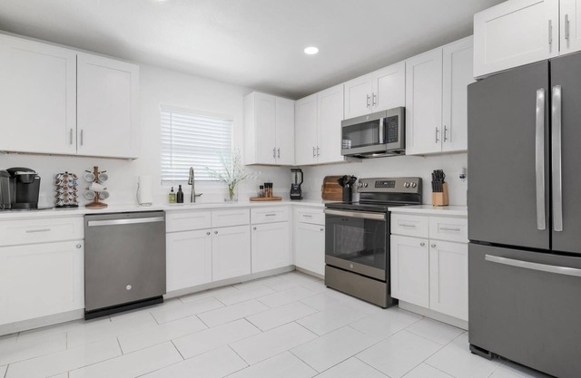"Stunning Home w/Heated Pool & Fenced Yard"