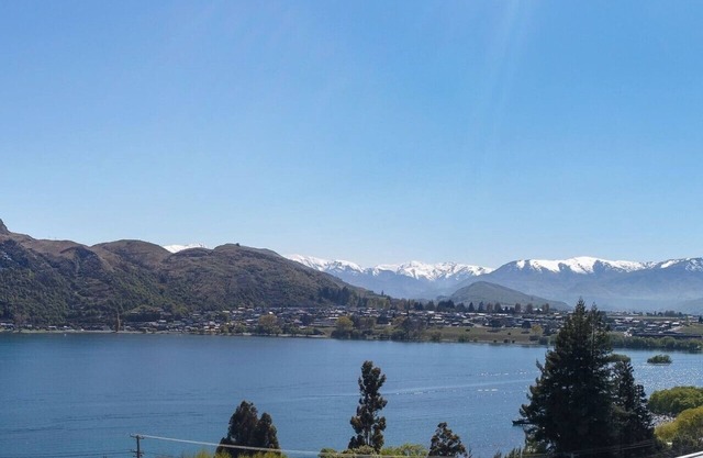 Impresionantes vistas a la montaña y al lago - casa tranquila y soleada
