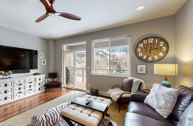 Stunning mountain-view home on Glacier Creek with deck, BBQ, and family friendly