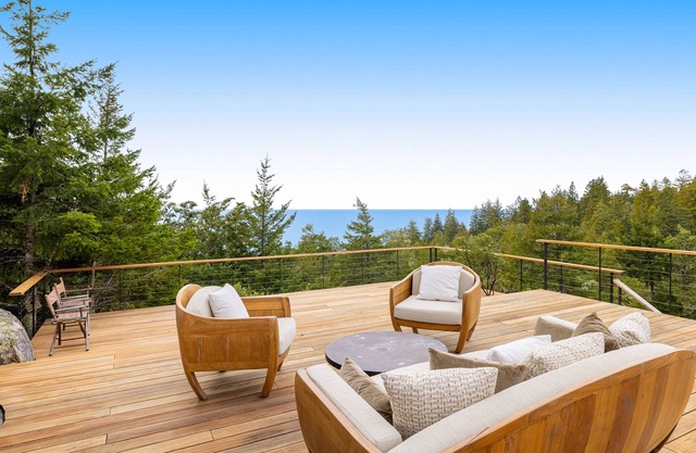 Stunning ocean view home with gourmet kitchen, luxe interior & large deck