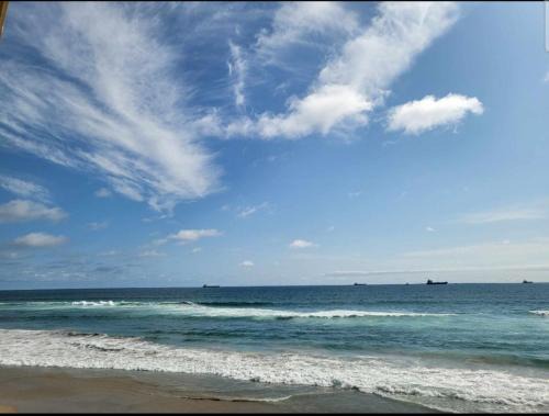 Stunning oceanfront condo on usable Sandy Beach