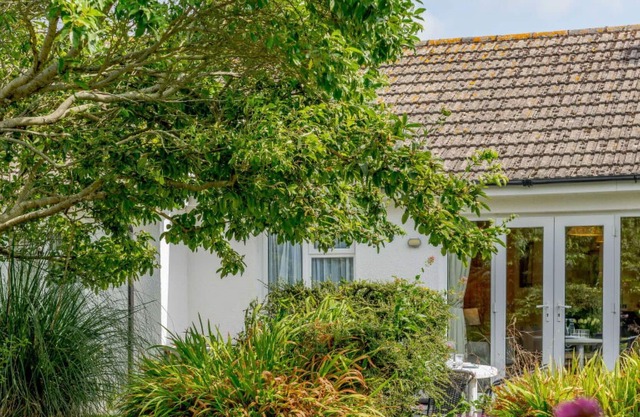 Estupenda casa de vacaciones privada con WIFI, TV, patio, mascotas permitida y aparcamiento