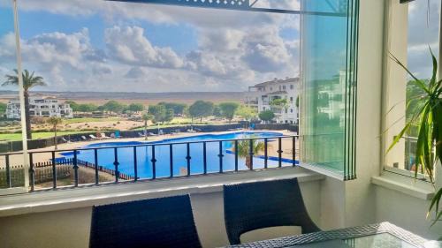 Stunning sunlight apartment with a pool view
