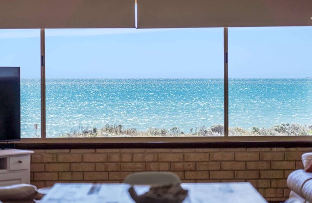 Stunning views from this beachside top floor 3 bedroom apartment