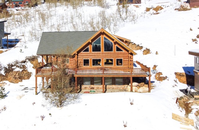 Stunning views, slopeside, welcoming cabin with hot tub and room for everyone