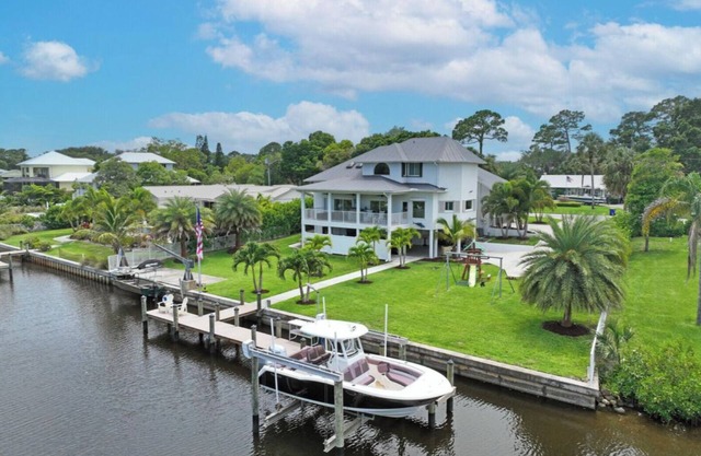 Stunning Water Front River House with Gourmet Kitchen & Large Boat Dock!