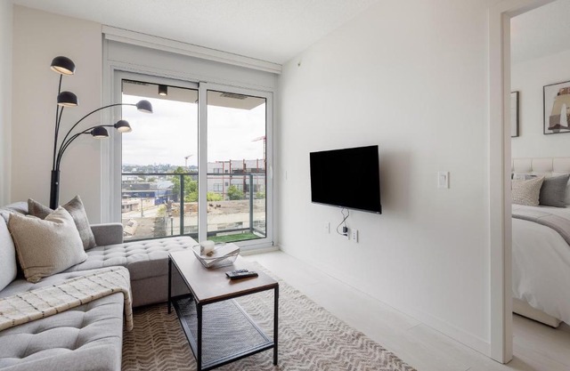 Stylish 2BR Retreat with Parking and Gym in Olympic Village