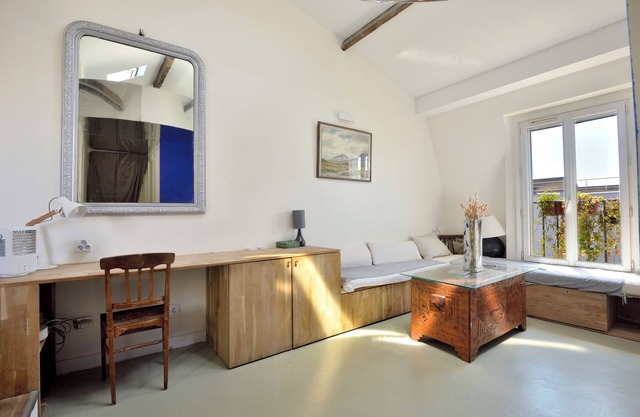 Stylish attic conversion in the rooftops of Paris