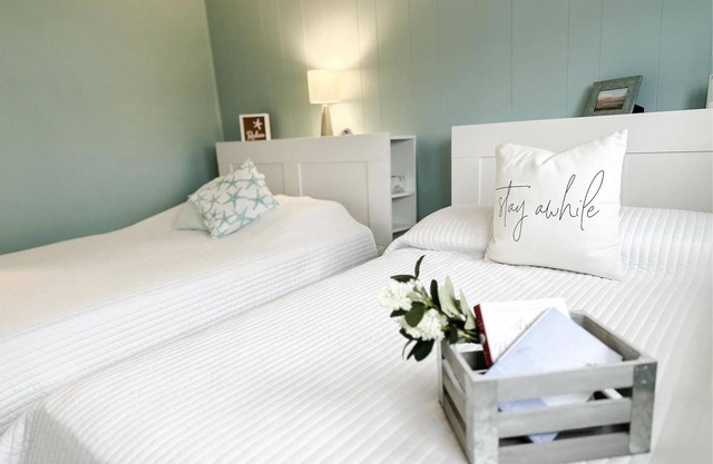 Stylish condo steps from the beach! Elegant blend of comfort and convenience.