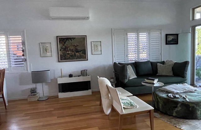 Stylish Garden Apartment With Keppel Island Views