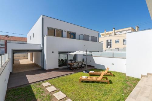 Stylish Home w/Garage & Terrace by HostWise