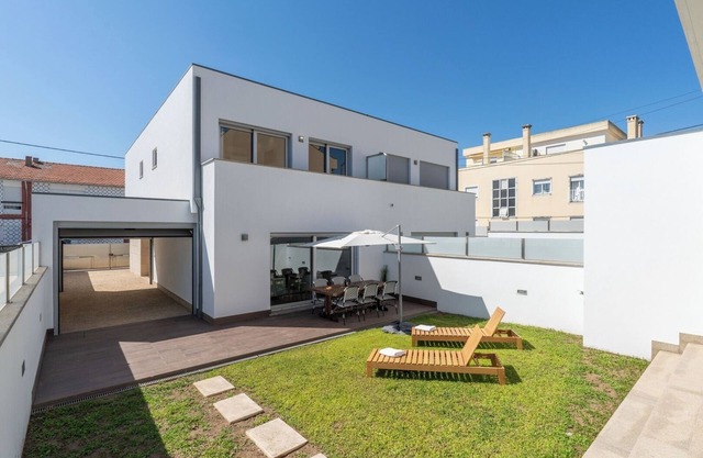 Stylish Home w/ Garage and Terrace by HostWise