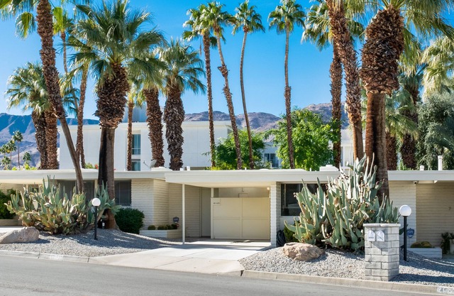Stylish Mid-Century home with Pool walking distance to all on El Paseo!