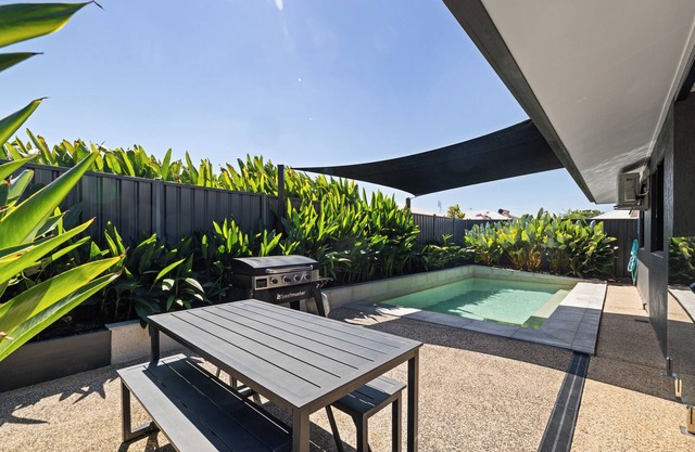 Escape to this stylish, fully airconditioned home in a quiet, leafy suburb