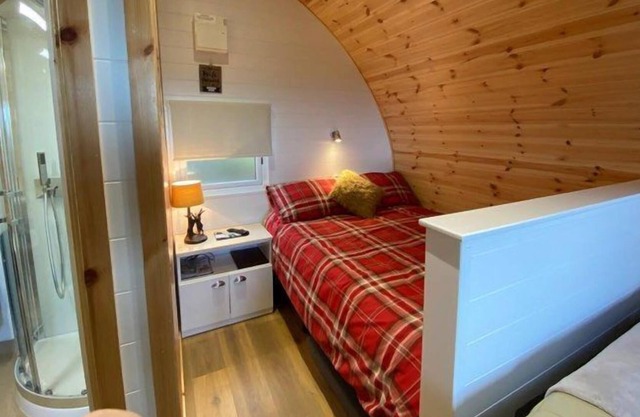 Stylish pod is situated in a large meadow