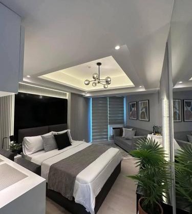 Stylish Stay at Azure North near Malls and Tourist Destinations