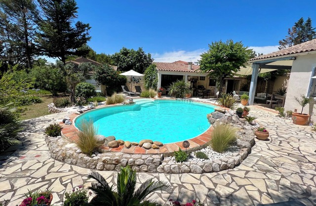 Stylish villa with landscaped pool set in large secluded garden close to Pezenas