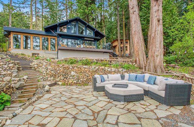 Stylish waterfront oasis w/ hot tub, fiber optic internet, & entertainer's deck