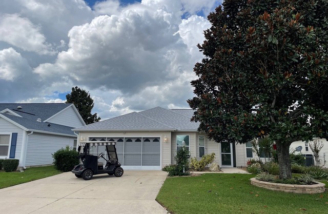 Stylish Winifred Home w/Lanai, Patio, & Golf Cart Near Lake Sumter Landing