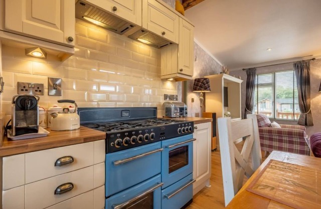 Suffolk Barn is a well-presented wooden holiday lodge, set within 300 acres of woodland and open hea