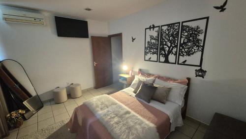 Suite climatizada, ao lado da praca principal