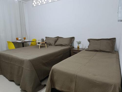 Suite com garagem 900 metros do Mar