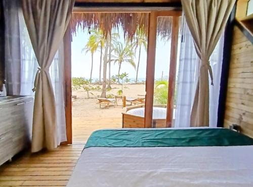Suite Premium con jacuzzi y playa cerca al Tayrona