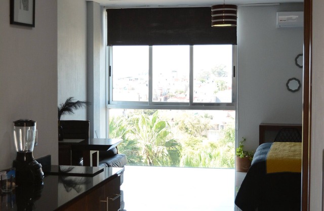 SUITE CON VISTA A LA CIUDAD