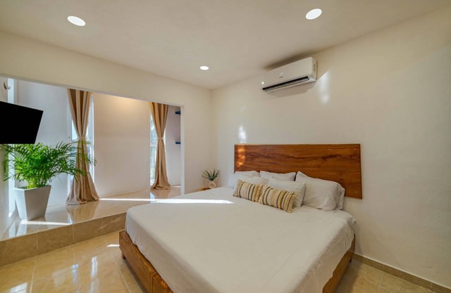 Suites Ha! Suite Iguana, relájate con su confort y disfruta de su linda terraza.