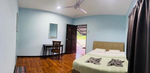 Sukau Backpackers Bed & Breakfast