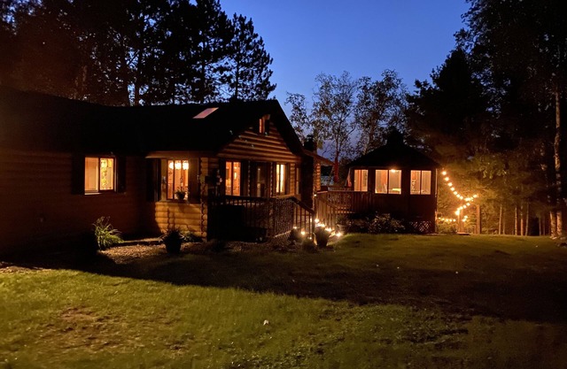 “Summerhouse” Surrounded by towering pines, big water views & sandy shores