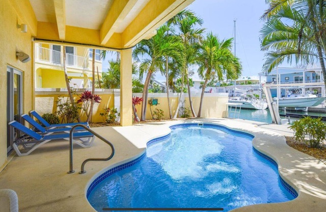 Summerland Airport Hangar Home with Pool, Private Runway and deep wide Canal
