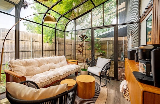 Sunlit Designer Home with Tranquil Sunroom Space