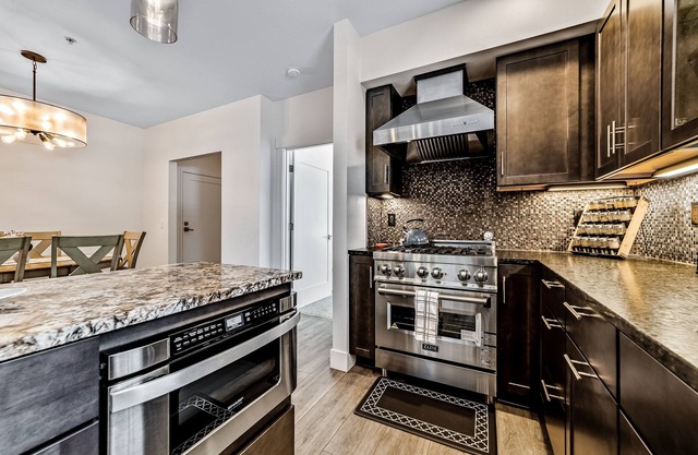 Sunny apartments with fireplace, partial ocean views, washer/dryer, grill & AC