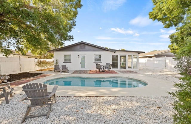 Sunny Palmetto Oasis: 4BR Home with Private Pool by RedAwning