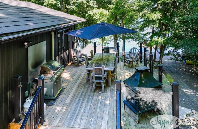 Sunrises! Hot tub! Outdoor Kitchen! Spacious beach! Multiple outdoor fire pits!