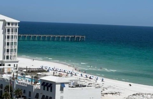 Sunset Bay Views! 3BR Condo with Pool, Dock and Beach Access