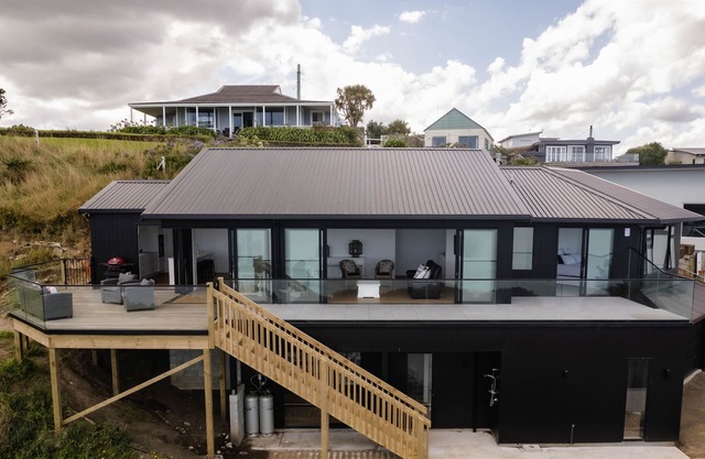 Sunset Delight. Beautiful home with expansive sea views.