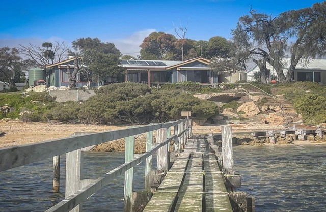 Sunset Ridge has direct access to a private beach and small jetty.